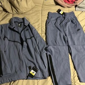 Brand new womens nike suit size small